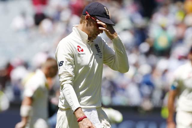 England's Joe Root shows the straing during the fourth Ashes Test match against Australia at the MCG in December. Picture: Jason O'Brien/PA