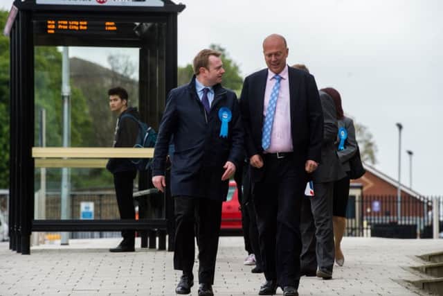 Transport Secretary Chris Grayling at Wakefield Kirkgate station on May 8, 2017, when he promised that rail electrification would go ahead in the North - a commitment now under fresh scrutiny.