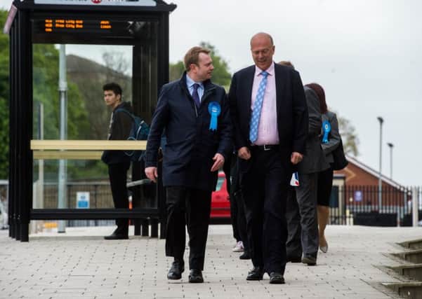 Transport Secretary Chris Grayling at Wakefield Kirkgate station on May 8, 2017, when he promised that rail electrification would go ahead in the North - a commitment now under fresh scrutiny.