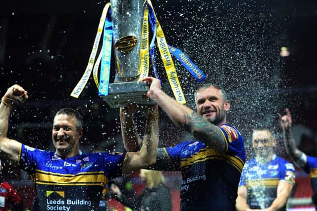 Danny McGuire and Jamie Peacock celebrate Leeds Rhinos 2015 treble-winning champagne moment. PIC: Jonathan Gawthorpe