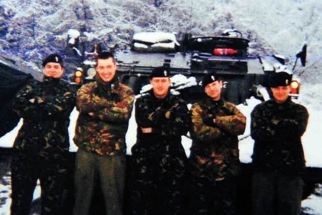 War veteran Simon Brown pictured left in 2001 in Germany. Picture by Simon Hulme