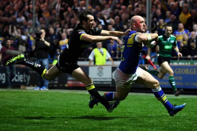Carl Ablett gets away from Stefan Ratchford to score.