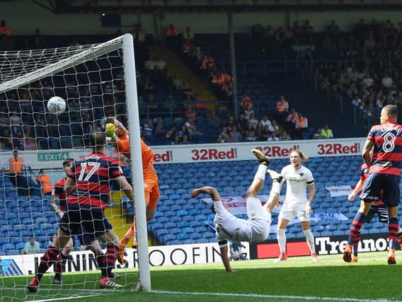 YOU BEAUTY: Kemar Roofe's overhead kick fires Leeds United in front.