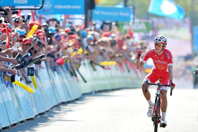 Stephan Rossetto, of Cofidis, celebrates his Tour de Yorkshire Stage 4 victory with highly vocal supporters at the finish in Leeds. PIC: Bruce Rollinson