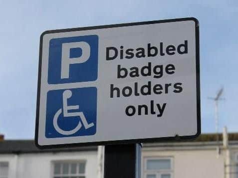 A disability parking sign.