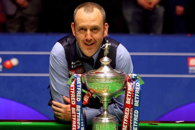 Mark Williams with the trophy after winning the 2018 Betfred World Championship at The Crucible, Sheffield. Picture: Richard Sellers/PA