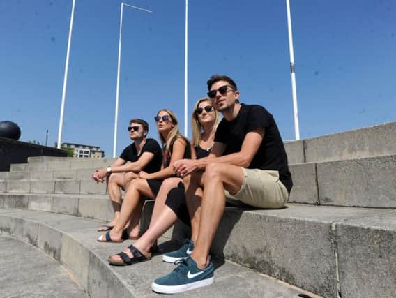 Tom Addy, Sarah Lane, Juliet Brine and Jonny Lane enjoying the sunshine at Leeds Dock as the May Bank Holiday broke temperature records. Picture: Scott Merrylees