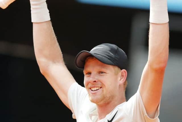 Kyle Edmund celebrates after beating Novak Djokovic 6-3, 2-6, 6-3 during the Madrid Open Picture: AP/Paul White