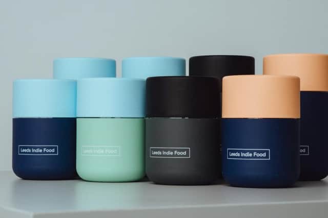 The annual festival will for the first time introduce its own branded reusable coffee cup
