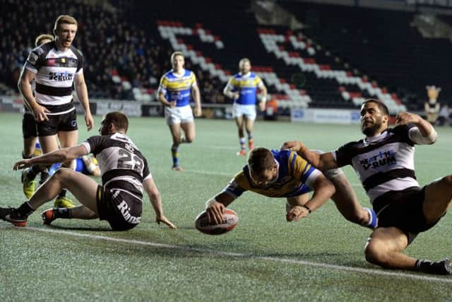 Stevie Ward scores Leeds Rhinos' fourth try at 
Widnes Vikings.