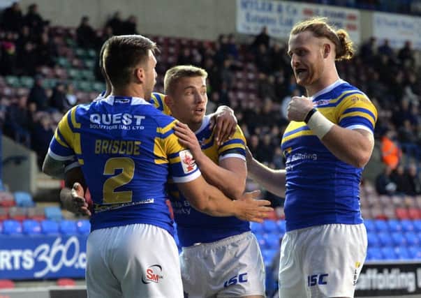 Tom Briscoe celebrates his opening try against 
Widnes Vikings.