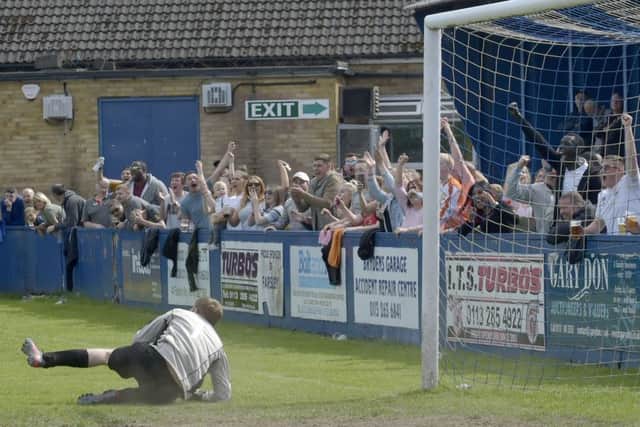 FC Beechwood goalkeeper Paul Rennison makes the winning save in the Leeds Combination League Luty Cup final triumph over South Seacroft. PIC: Steve Riding