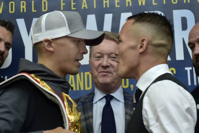 Josh Warrington and Lee Selby exchange words at today's Elland Road press conference. Picture: Steve Riding.