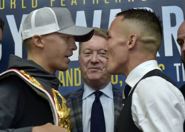 IBF featherweight champion Lee Selby squares up to Leeds' Josh Warrington. PIC: Steve Riding