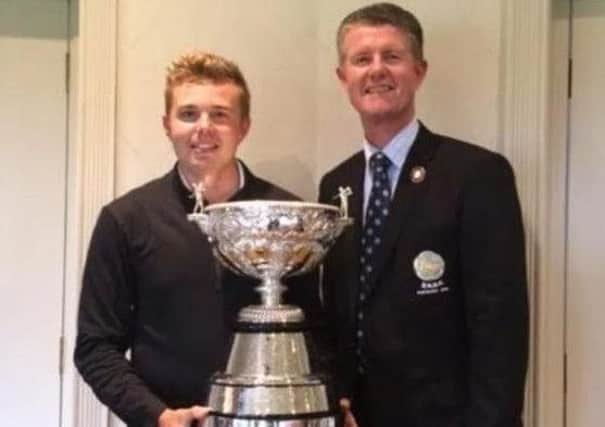 Ben Hutchinson seen receiving the Yorkshire amateur championship trophy from then YUGC president Jonathan Plaxton after his victory at Moortown two years ago.