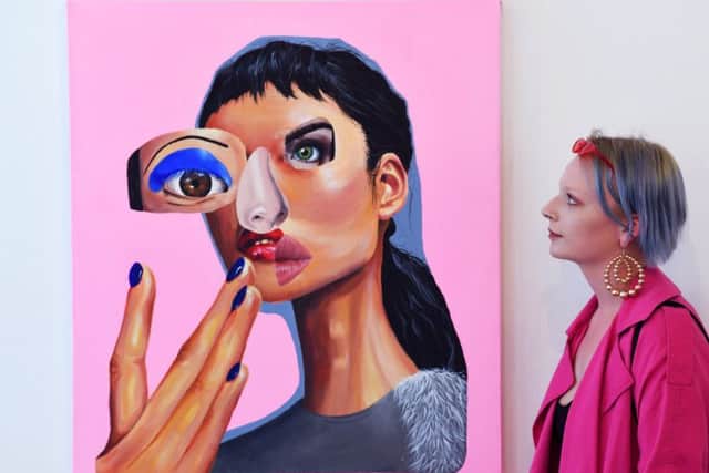 Second year BA Honours fine arts students from  Leeds Arts University showcased  their work at the TWO exhibition at the Wharf Chambers gallery space in Leeds city centre. Dionne Towey views the work of fellow student Isabella Adam Beirne.3rd May 2018.Picture Jonathan Gawthorpe