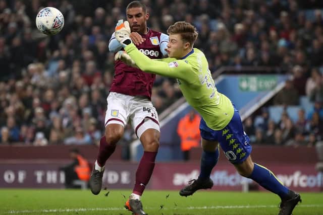 Bailey Peacock-Farrell denies Lewis Grabban during Leeds United's 1-0 defeat to Aston Villa last month.