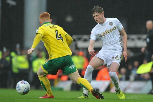 Tom Pearce gets the better of Norwich's Harrison Reed.