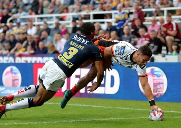 Castleford Tigers Jy Hitchcox touches down against Leeds Rhinos.