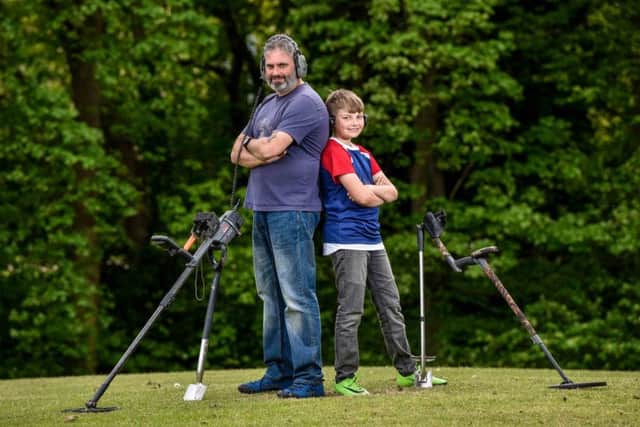 Andy Firth and his son Ryan, 10, found a 13th to 14th century gold medieval ring brooch while out metal detecting