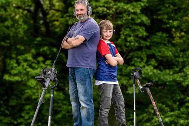 Andy Firth and his son Ryan, 10, found a 13th to 14th century gold medieval ring brooch while out metal detecting