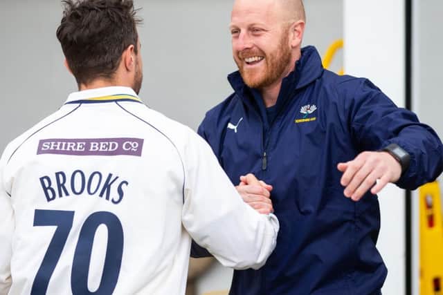 Yorkshire coach Andrew Gale with the returning Jack Brooks. PIC: Alex Whitehead/SWpix.com