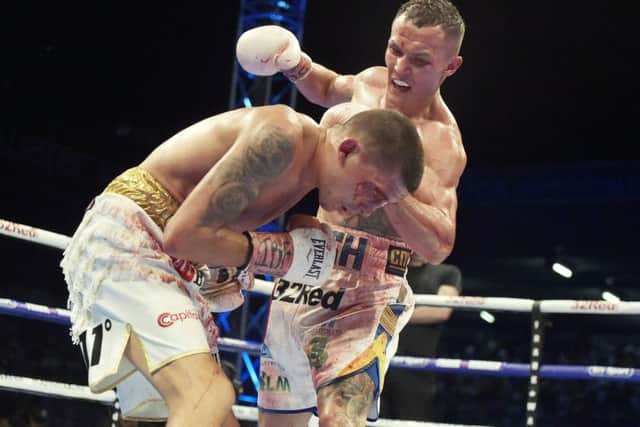 Josh Warrington on the attack against Lee Selby.