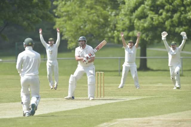 Nishant Desai, for Collingham, gets the wicket of Hall Park's Marco Wyngard (lbw) during Saturday's second division encounter won by hosts Horsforth by 15 runs. PIC: Steve Riding