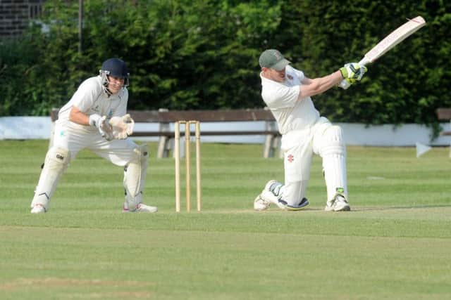 Six runs for Dan White, who scored 127 not out as Carlton defeated Jack Hampshire Cup visitors, Oulton, by eight wickets. PIC: Steve Riding