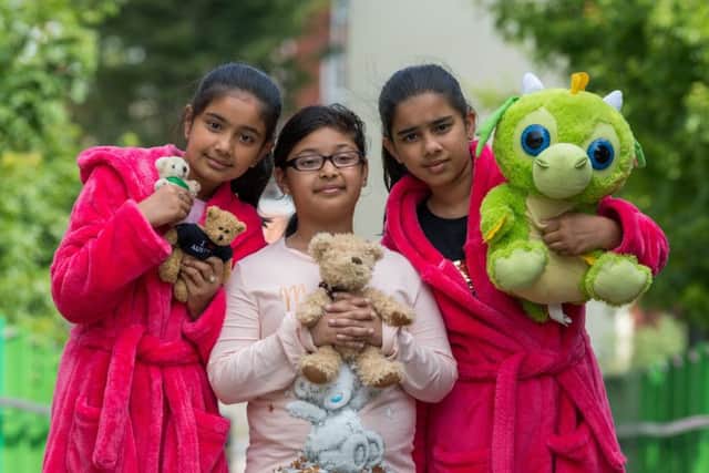 Date: 24th May 2018.
Picture James Hardisty.
Bankside Primary School, Chapeltown, Leeds, held a pyjama themed non-uniform day to raise money for the YEP's Half and Half Appeal. Pictured (left to right) Hava Khan, 10, Aminah Shabir, 9, and Husna Khan, 10.