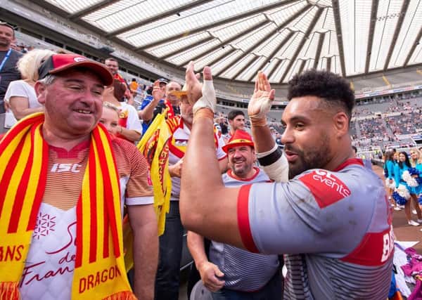Jodie Broughton celebrates with the Catalans Dragons fans at St James' Park.