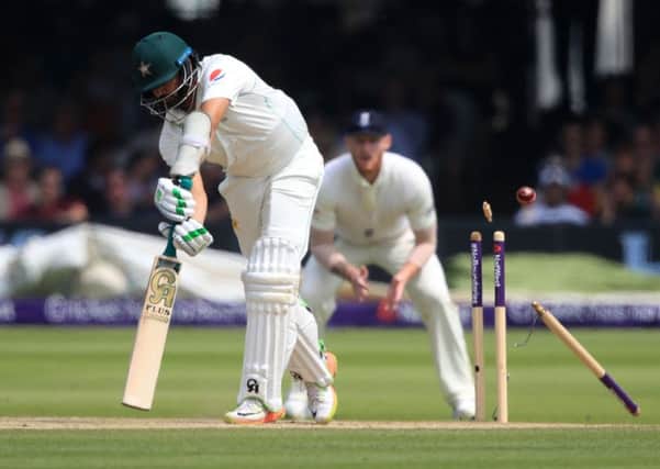 Scant consolation: Pakistan's Azhar Ali is bowled by England's James Anderson.