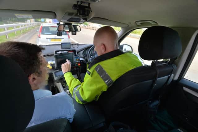 West Yorkshire Police's road policing unit, PC Chris Worsnop. 22 May 2018.  Picture Bruce Rollinson
