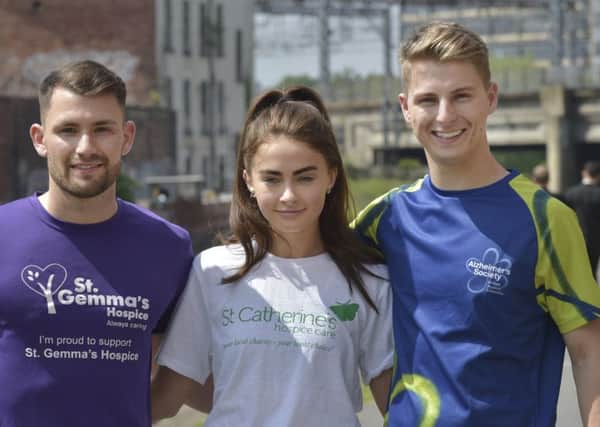 Jamie Sheard, Lena Hughes and Sam Gibson, who completed their gruelling challenge for charity on Monday.
