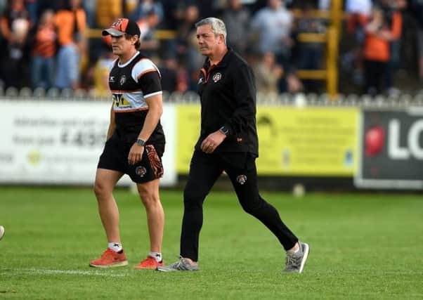 Frustrated Castleford Tigers coach, Daryl Powell, right.