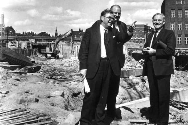 Minister of Transport Tom Fraser is given a tour of part of the inner ring road construction site in 1965 by Leeds city engineer CG Thirlwall.