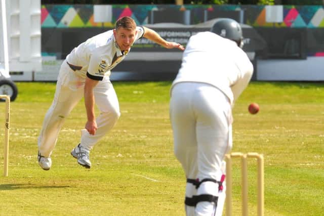 Pudsey bowler Richie Lamb, who took four wickets as Townville were bowled out for 147. PIC: Steve Riding