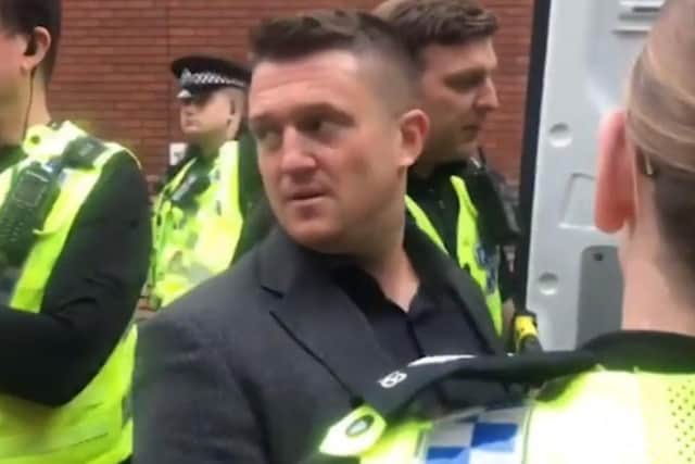 Tommy Robinson outside Leeds Crown Court. A screengrab from a video taken of Robinson as he was arrested by police.