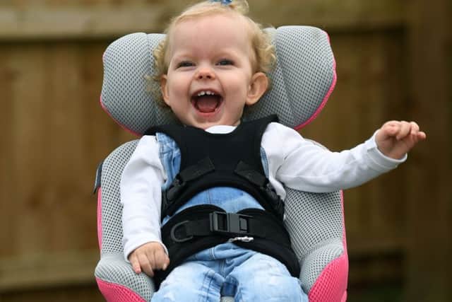 The mother of a 20-month-old toddler from Fitzwilliam, who has limited use of her arms and legs  has launched a Â£20,000 fundraising drive to take her for specialist treatment in Panama. Imogen Holmes was diagnosed with spastic quadriplegic cerebral palsy at Pinderfields Hospital in June 2017. Imogens mother Briony Winstanley has started a Â£20,000 fundraising drive to to pay for stem cell treatment for Imogen in Panama in central America. Imogen pictured with her parents Briony Winstanley and Stephen Holmes.
9th March 2018.
Picture Jonathan Gawthorpe