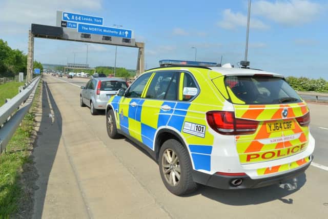 A car is pulled over on the M1 northbound.
