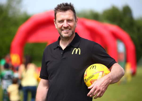 Former Leeds United player Lee Sharpe at the McDonald's and FA Community Football Day at Astley & Tyldesley Junior Football Club.