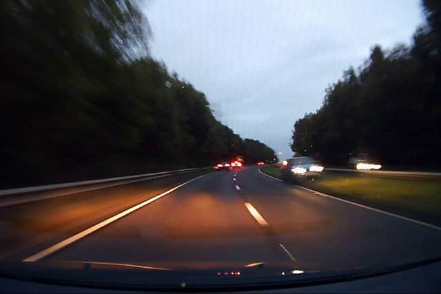 Dash cam footage shows how cars narrowly avoided colliding with what looks like a Range Rover when it careered into oncoming traffic (Photo: SWNS)