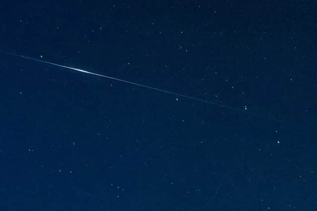 The satellites appear in a line crossing the night sky and their current orbital position has made them easier to spot (Photo: Shutterstock)