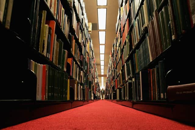 A man browses through books at a library. Picture: Justin Sullivan/Getty Images.