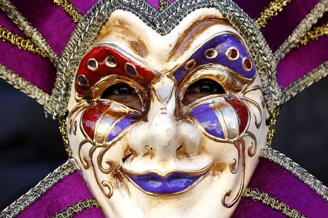 Mardi Gras parades typically feature masked and costumed participants (Getty Images)